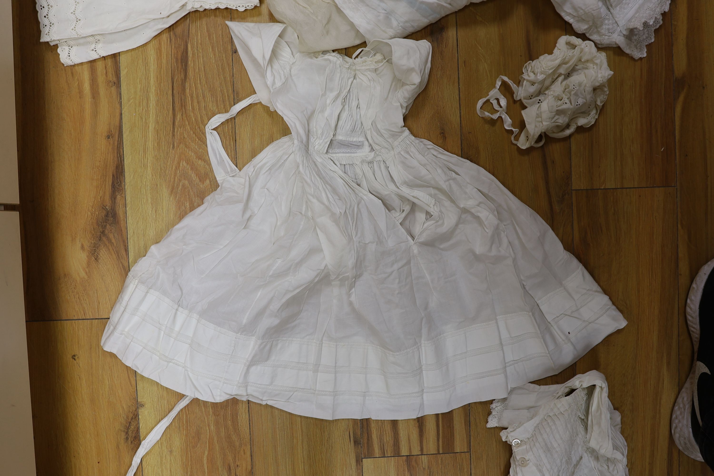 A collection of whiteworked baby gowns